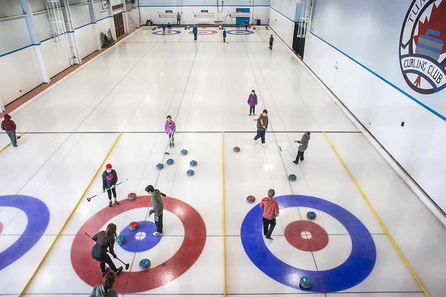 Image Depicts Aerial of curling rink